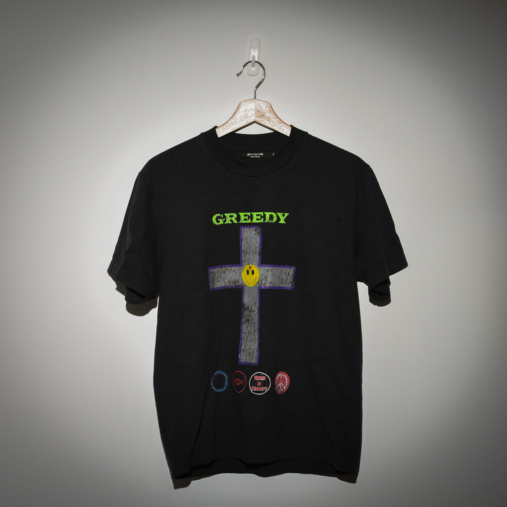 Greedy Unit Stone Believer tee front view showing GREEDY cross graphic