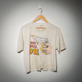 Vintage I Don't Dial 911 tee full view on hanger showing cropped fit