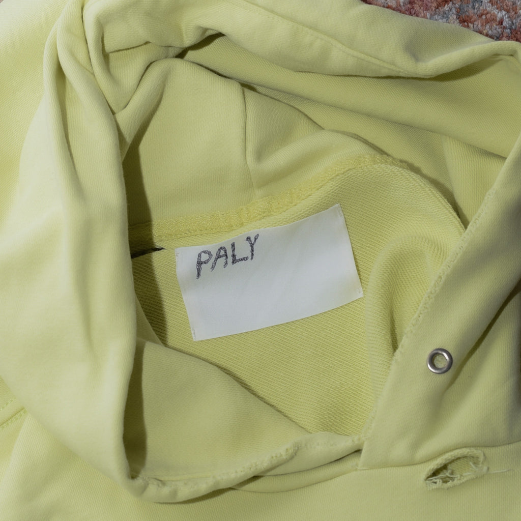 Paly Hollywood hoodie hand-written name tag label close up