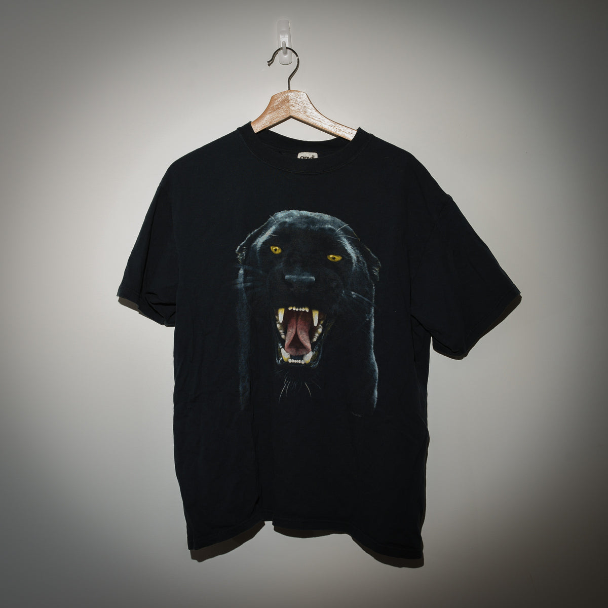 Vintage Human I black panther tee full view on hanger
