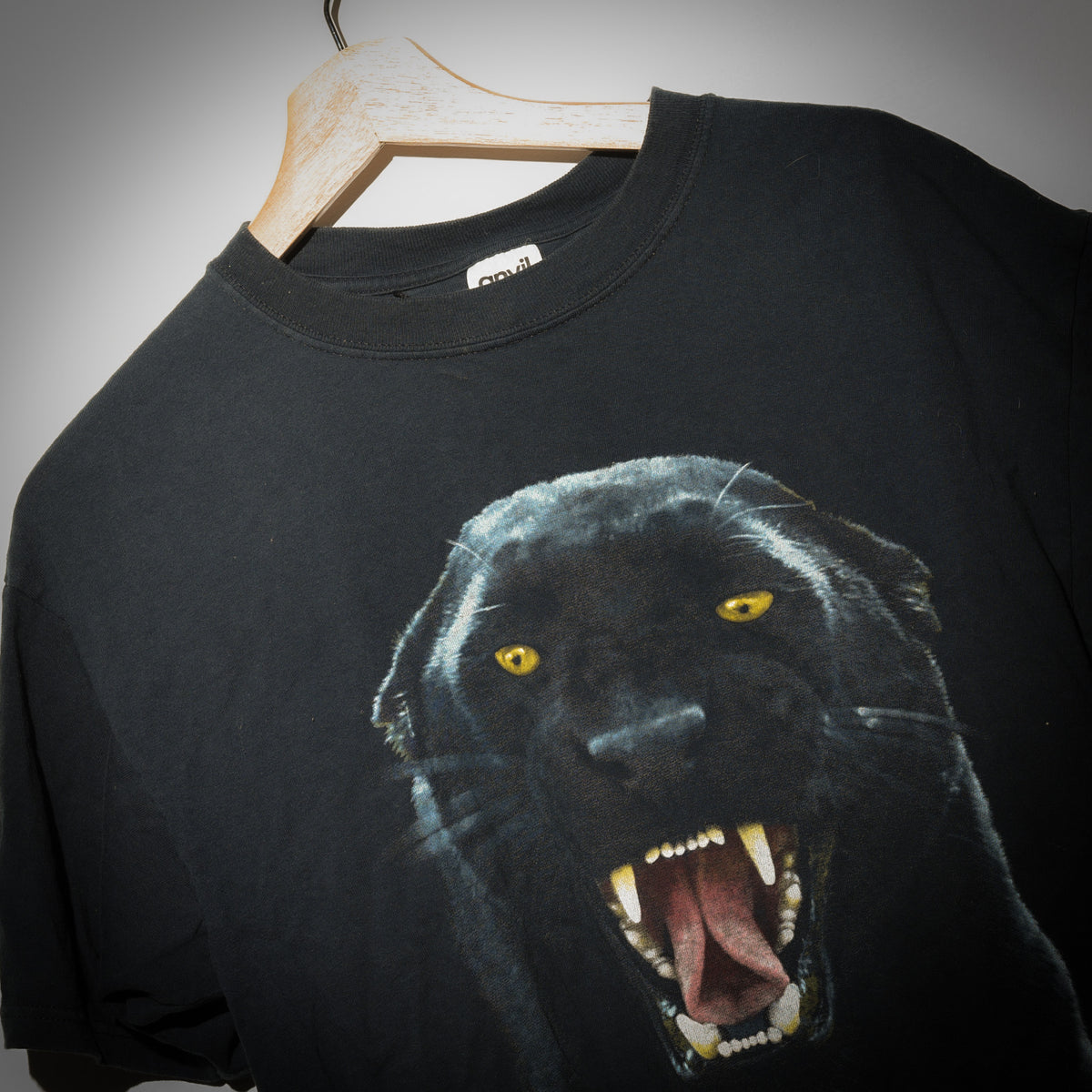 Vintage Human I black panther tee close up graphic detail with yellow eyes