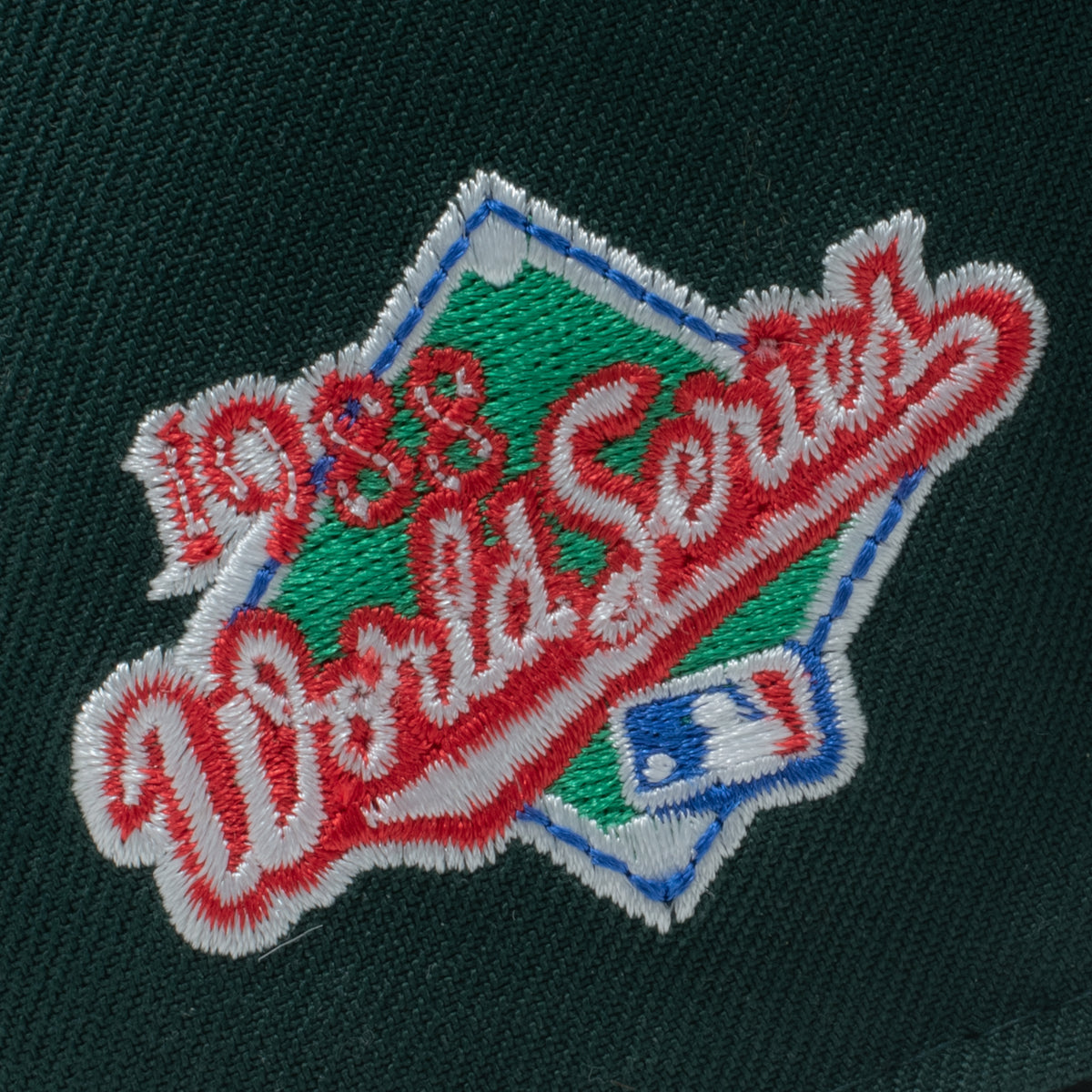 New Era LA Dodgers fitted hat 1988 World Series commemorative patch close up in red white and green
