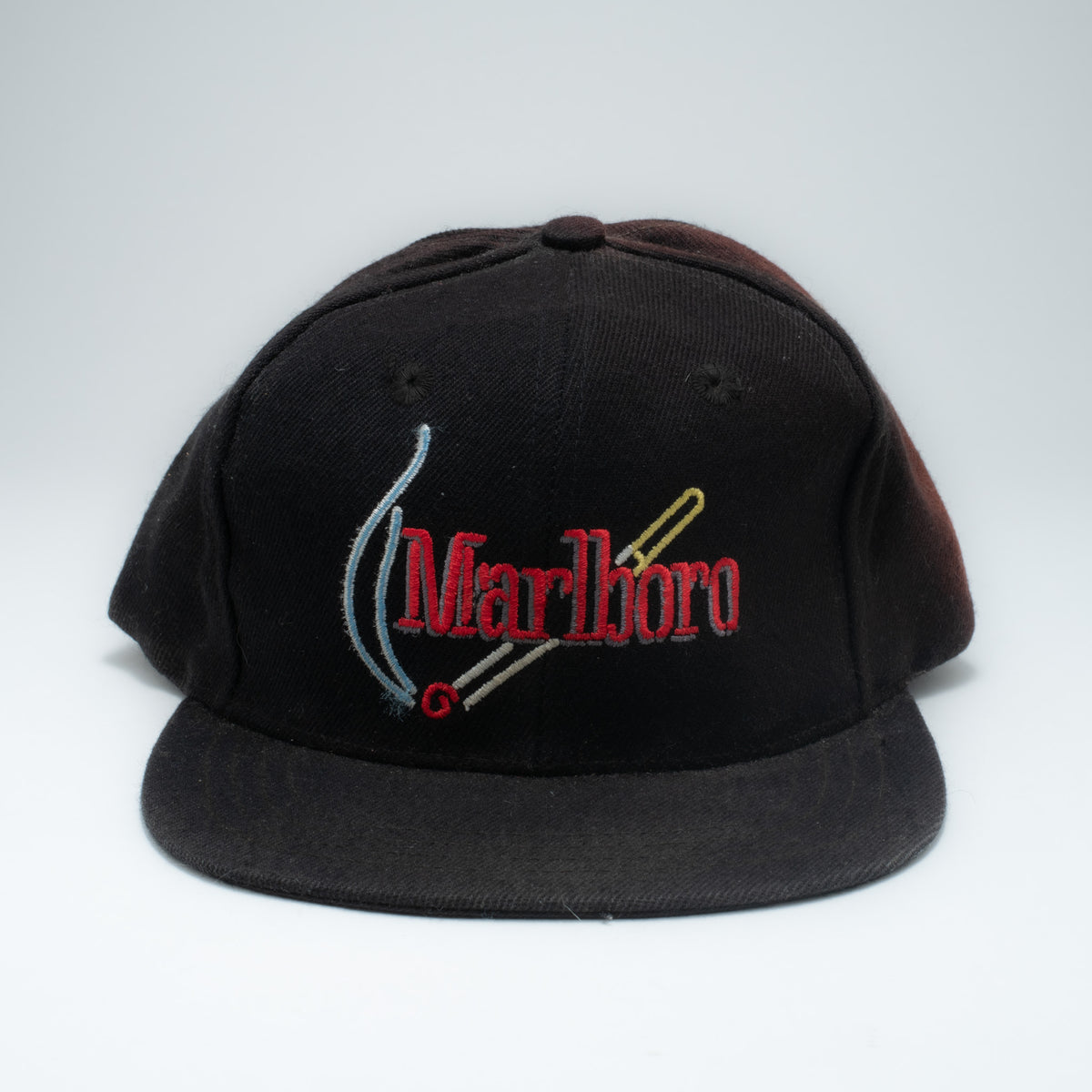 Vintage Marlboro 5-panel strapback cap front view showing multicolor embroidered script