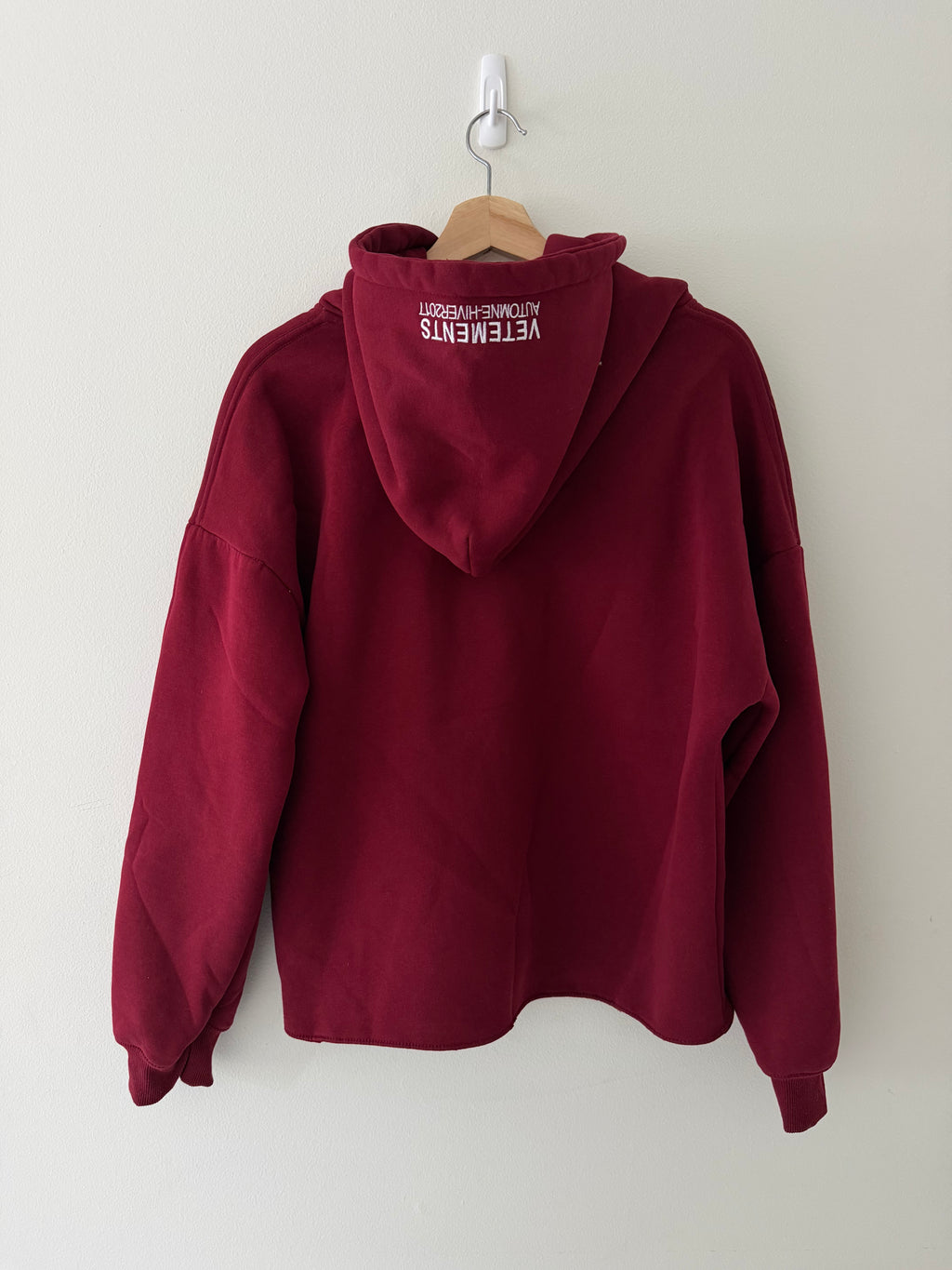 Vetements AW2017 hoodie back view showing clean burgundy silhouette