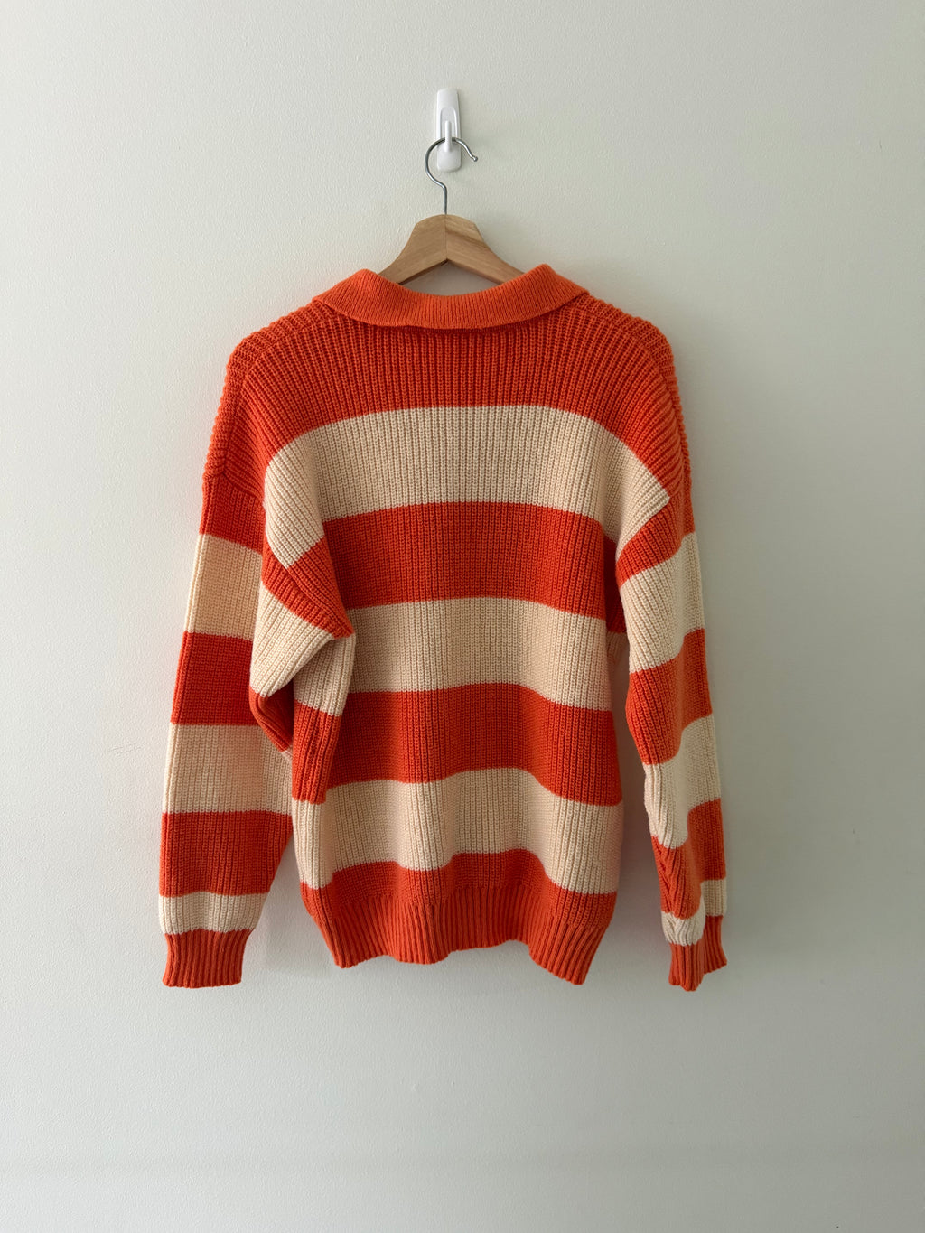Vintage knit stripe polo sweater back view showing wide stripe pattern and ribbed hem