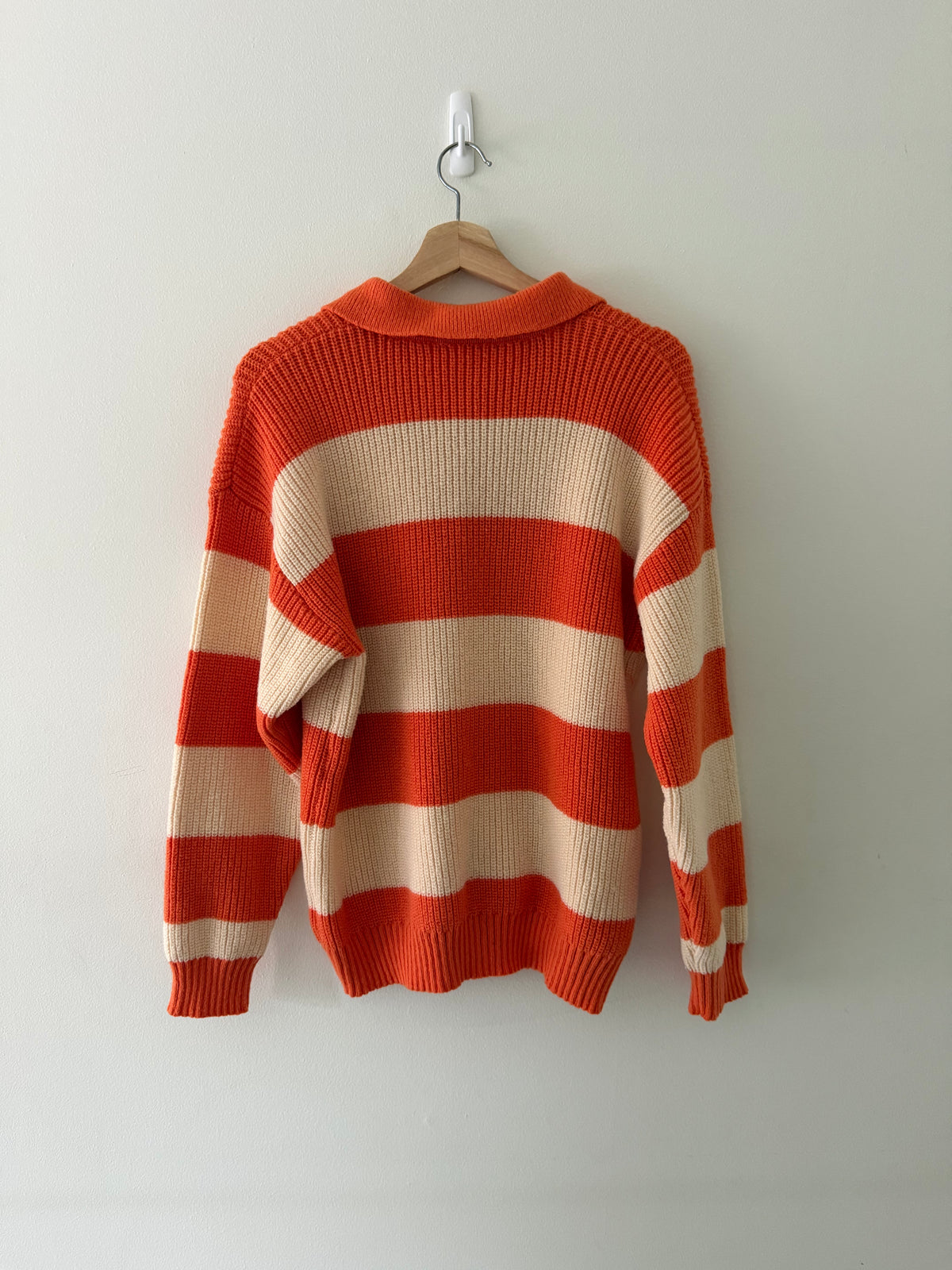 Vintage knit stripe polo sweater back view showing wide stripe pattern and ribbed hem