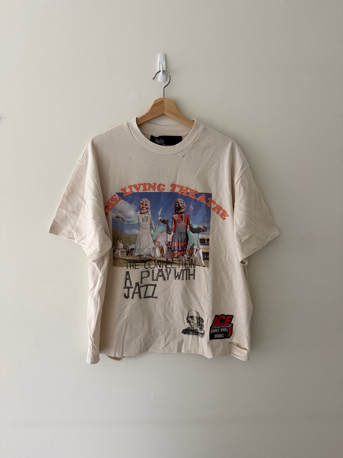 Paly Hollywood The Living Theatre tee full view on hanger showing oversized fit and photographic print