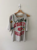 Elephant Man Original hand-drawn Champion tee full view showing 1990 Rio Grande City Girls Athletics print with multicolor illustrations