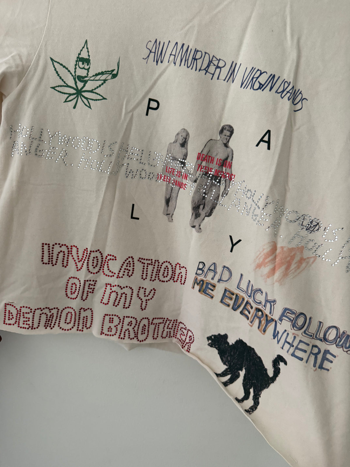 Paly Hollywood bedazzled tee front graphic close up showing rhinestone text INVOCATION OF MY DEMON BROTHER and photographic print