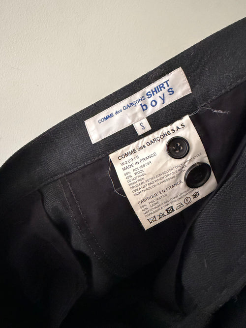 Comme des Garçons SHIRT Boys trousers interior label close up showing COMME des GARCONS SHIRT boys size S Made in France W26916
