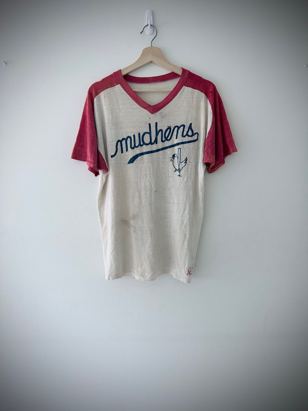 Larry Lowe Sportswear XL size tag on Mudhens jersey