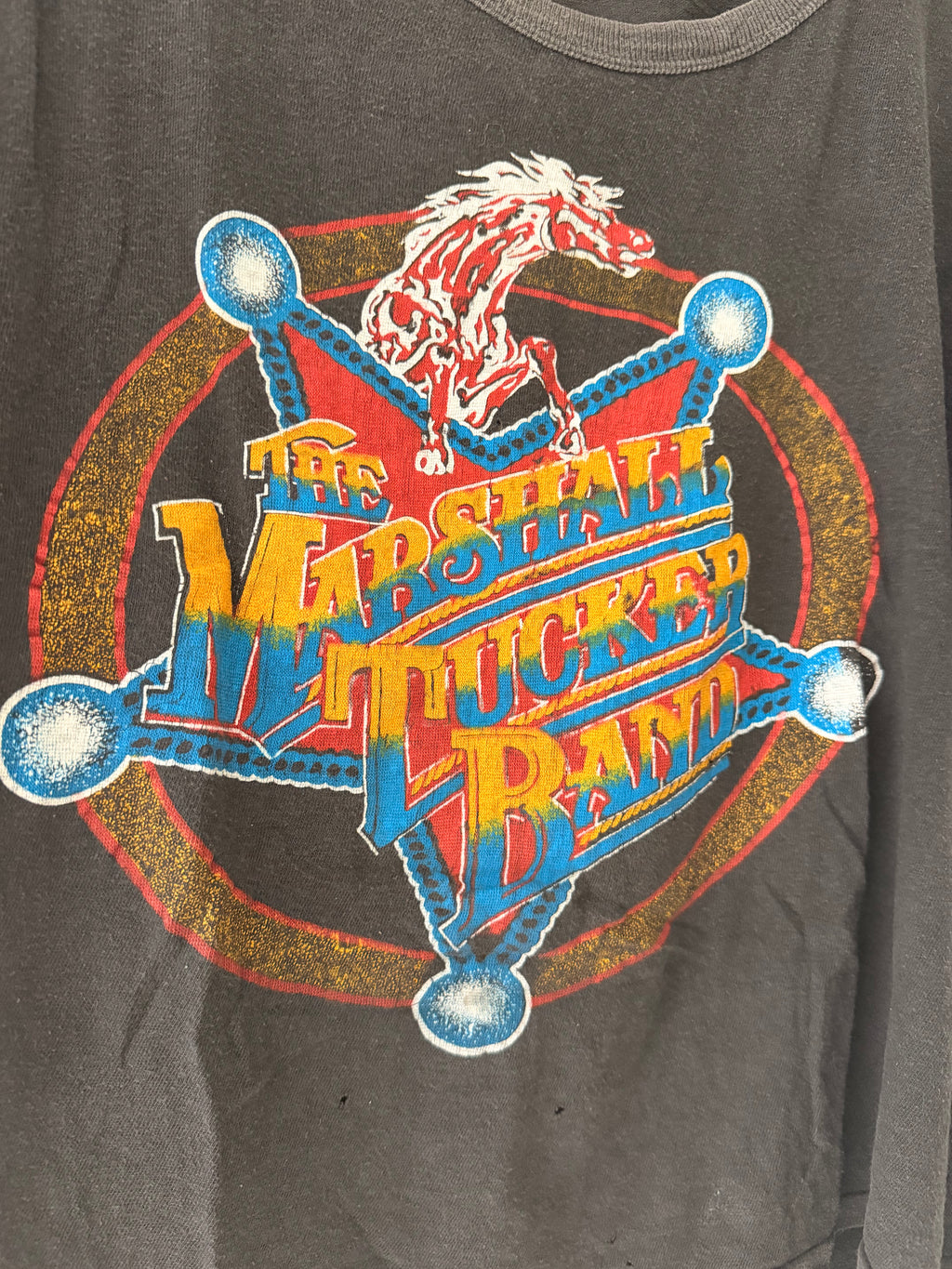 Close-up of Marshall Tucker Band front graphic