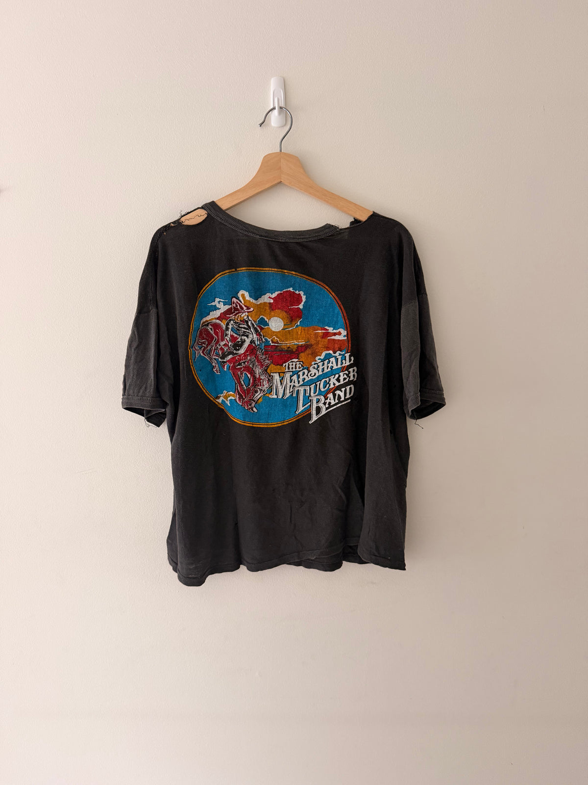 Marshall Tucker Band t-shirt on hanger, front view
