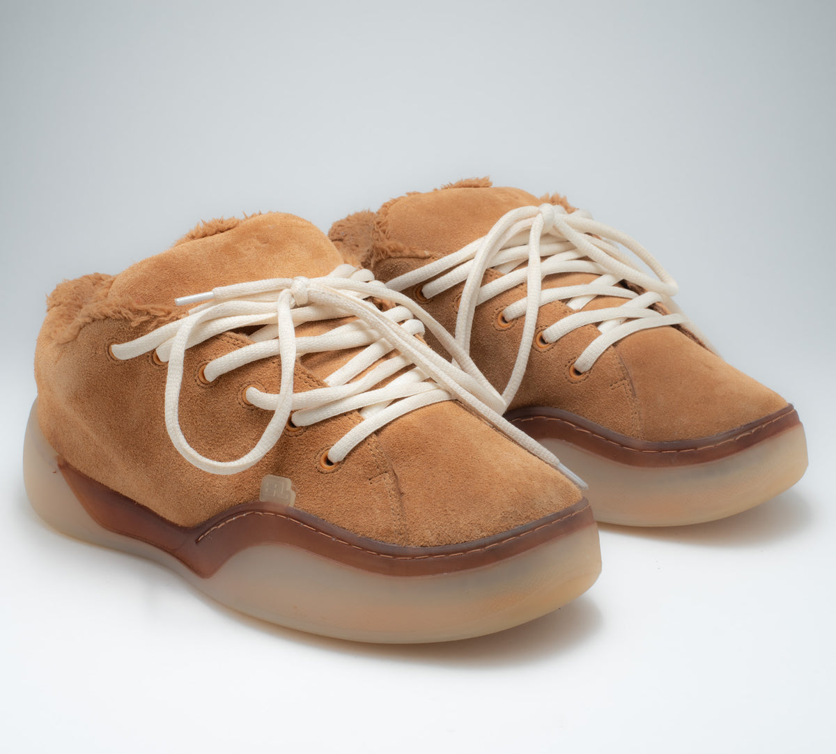 ERL Vamp sneaker pair view showing honey tan suede and shearling collar